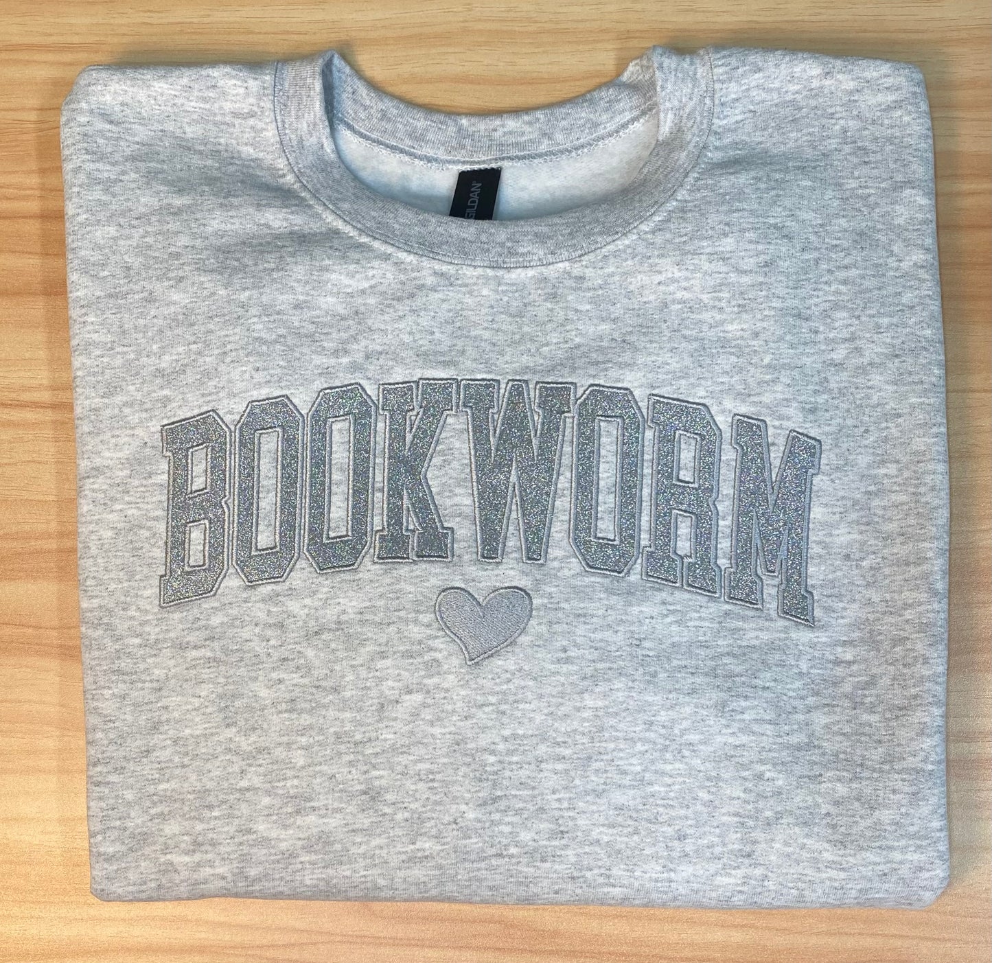 BOOKWORM Appliqué Glitter Crewneck Sweatshirt